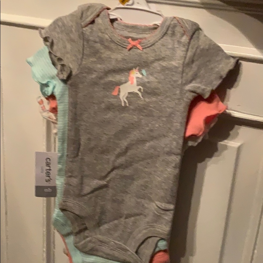 Girl Newborn short sleeve onesie.